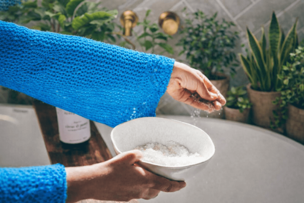 Adding Epsom salt to a bath for relaxation, better sleep, and stress relief.